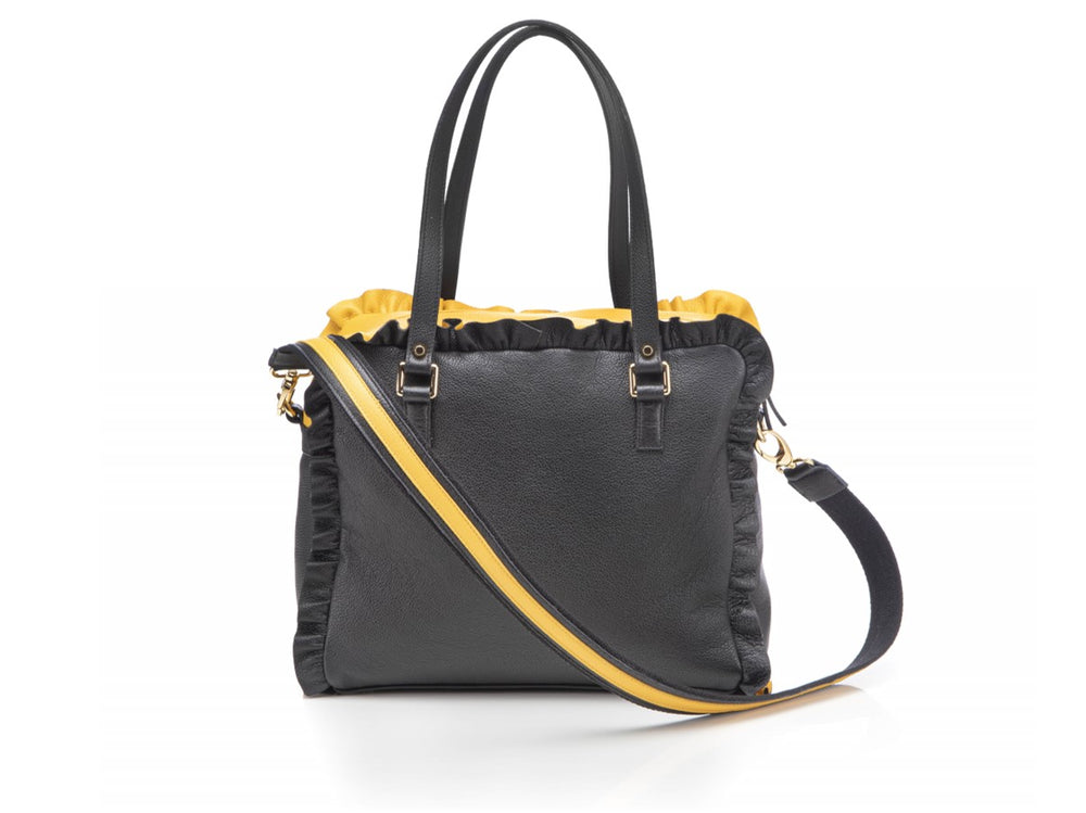 
                      
                        Borsa in pelle MARY con frappe giallo
                      
                    