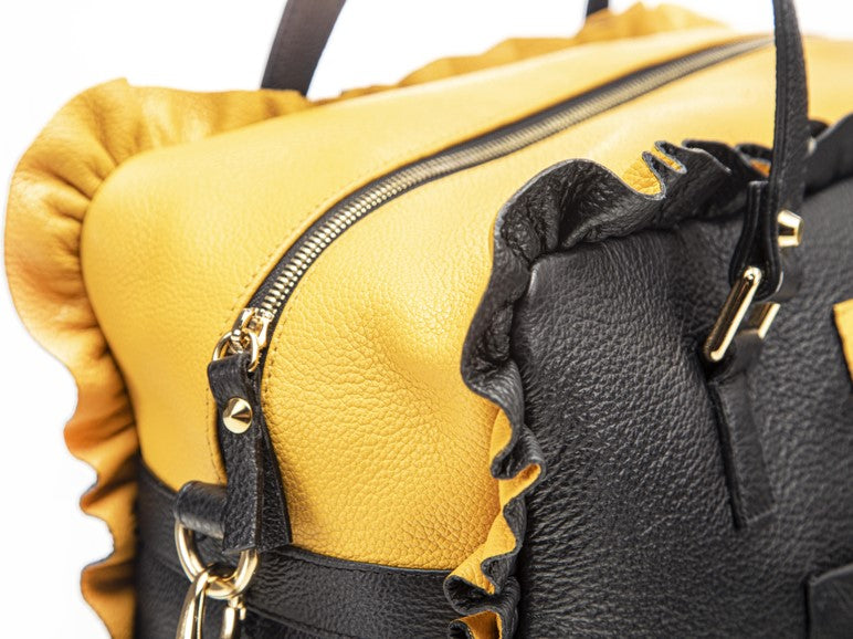 
                      
                        Borsa in pelle MARY con frappe giallo
                      
                    