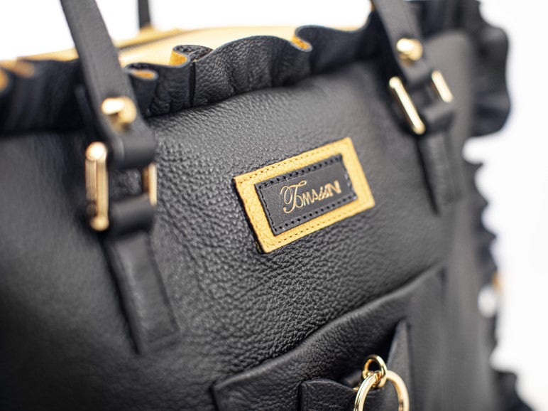 
                      
                        Borsa in pelle MARY con frappe giallo
                      
                    