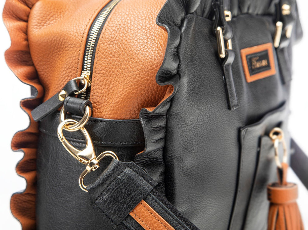 
                      
                        Borsa in pelle MARY con frappe cuoio
                      
                    