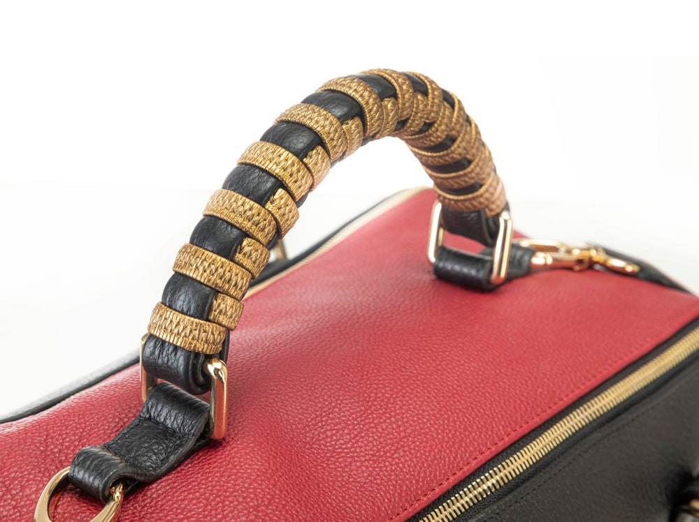 
                      
                        Borsa in pelle Mary rossa manico
                      
                    